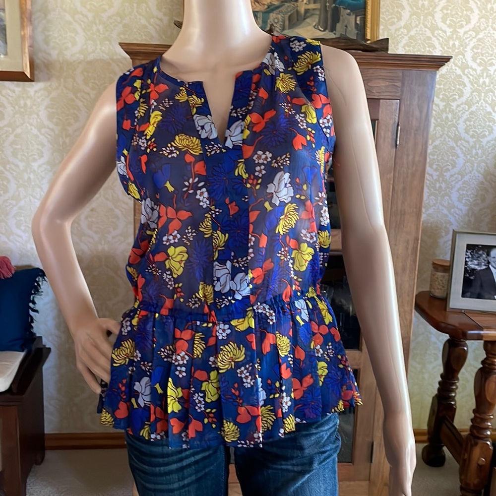 Sheer sleeveless floral blouse